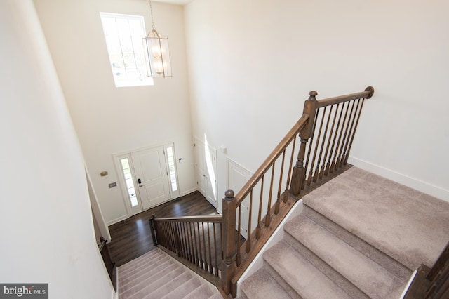 304 Regulator Dr S, Cambridge, MD 21613 - foyer entrance with stairway, baseboards, wood finished floors, and a high ceiling