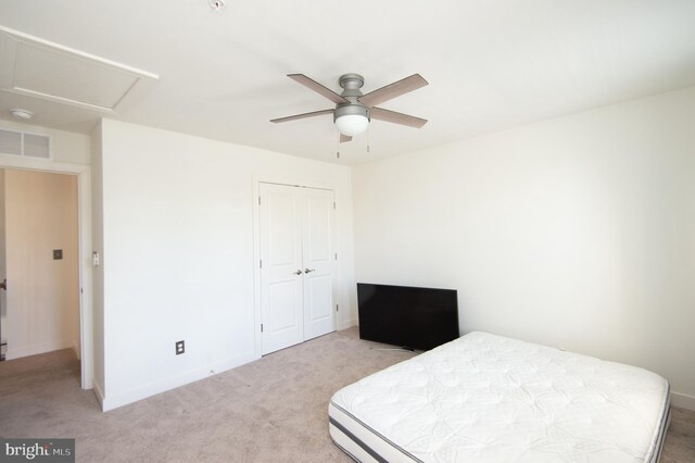 304 Regulator Dr S, Cambridge, MD 21613 - carpeted bedroom featuring a closet, attic access, ceiling fan, baseboards, and visible vents