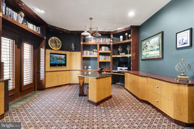 office area featuring recessed lighting, built in desk, and dark carpet