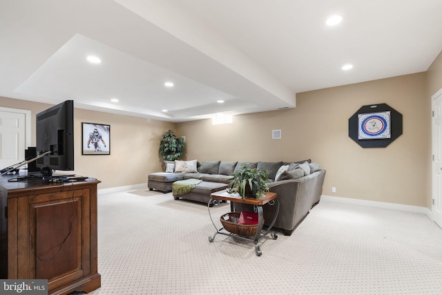 living area with baseboards, recessed lighting, and light colored carpet