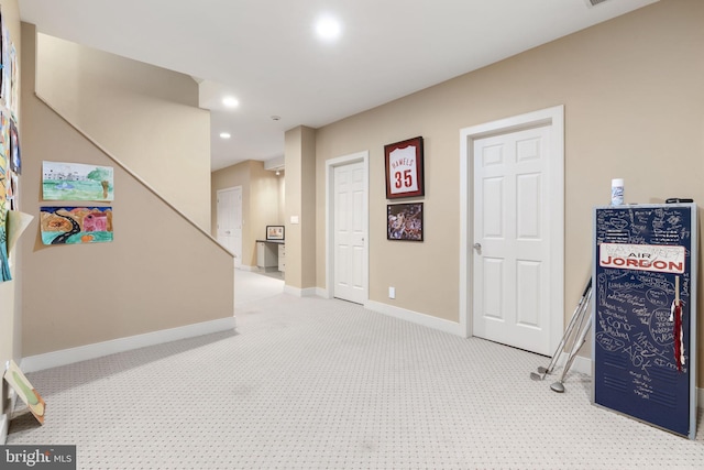 interior space with recessed lighting, carpet flooring, and baseboards
