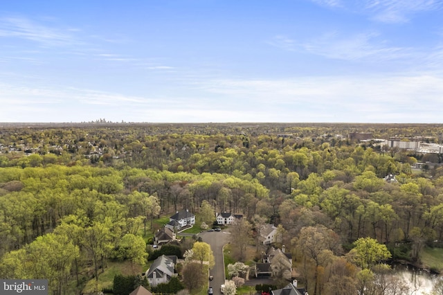 aerial view with a wooded view