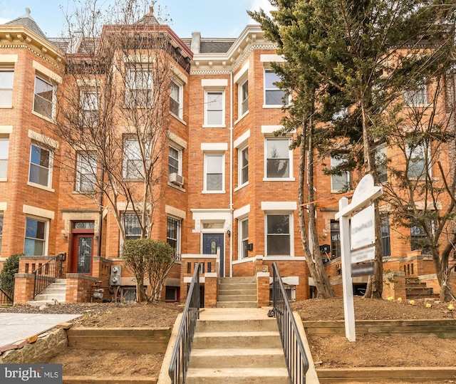 3218 13th St NW, Washington, DC 20010 - view of front facade featuring brick siding and cooling unit