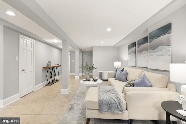 3218 13th St NW, Washington, DC 20010 - living room with recessed lighting, radiator heating unit, baseboards, and light tile patterned floors