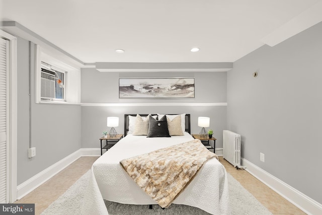 3218 13th St NW, Washington, DC 20010 - bedroom with light tile patterned floors, baseboards, radiator heating unit, and recessed lighting