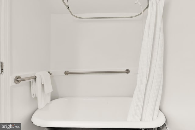 3218 13th St NW, Washington, DC 20010 - bathroom with a washtub and a shower with shower curtain