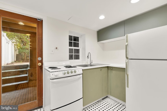 3218 13th St NW, Washington, DC 20010 - kitchen with recessed lighting, light countertops, a sink, white appliances, and green cabinets