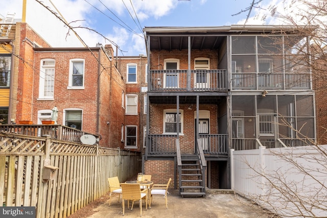 3218 13th St NW, Washington, DC 20010 - back of house with brick siding and fence
