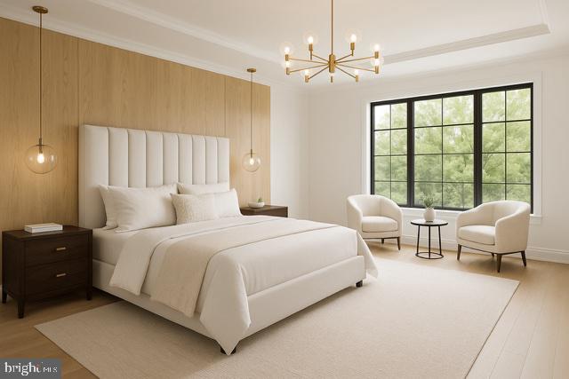 9210 Marseille Dr, Potomac, MD 20854 - bedroom featuring light wood finished floors, a chandelier, and a raised ceiling