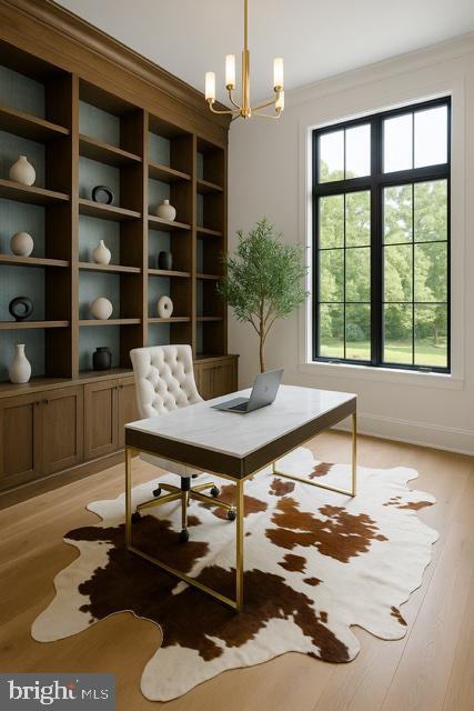9210 Marseille Dr, Potomac, MD 20854 - office space featuring light wood-type flooring, a chandelier, and crown molding