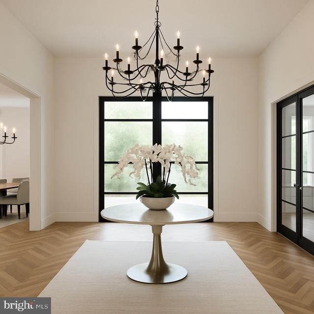 9210 Marseille Dr, Potomac, MD 20854 - dining area featuring a chandelier, plenty of natural light, and baseboards