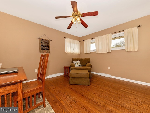 sitting room featuring visible vents, ceiling fan, wood finished floors, and baseboards