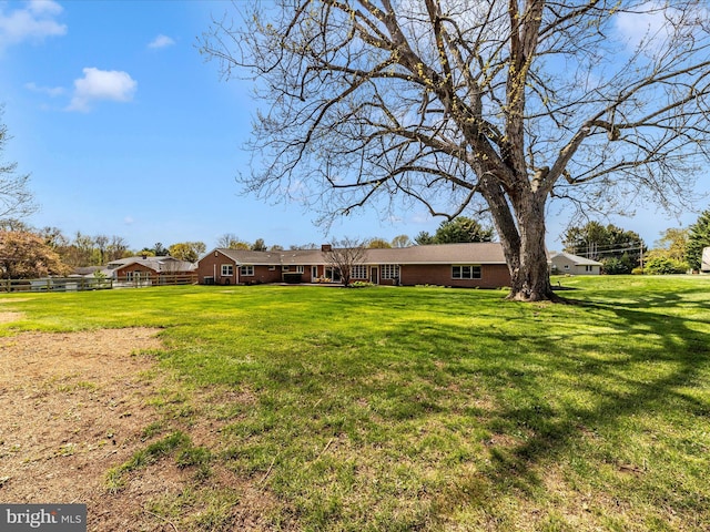 view of yard with fence