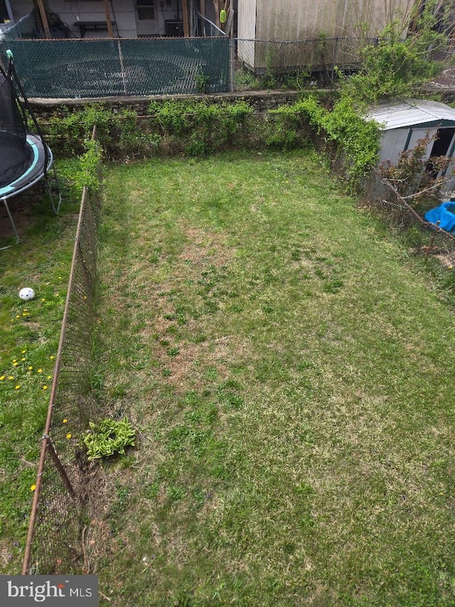 3660 Academy Rd, Philadelphia, PA 19154 - view of yard with a trampoline and fence