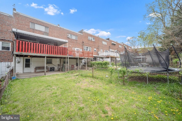 3660 Academy Rd, Philadelphia, PA 19154 - view of yard featuring fence, a patio area, central air condition unit, and a trampoline