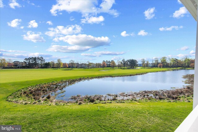 property view of water featuring view of golf course