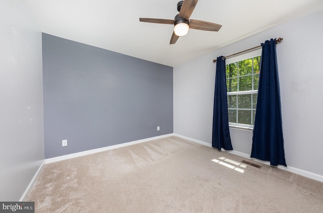 7464 Cedar Fork Rd, Ruther Glen, VA 22546 - carpeted spare room featuring a ceiling fan, baseboards, and visible vents