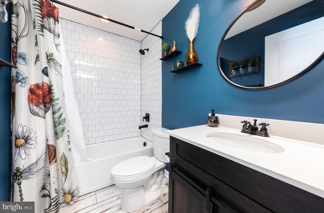 7464 Cedar Fork Rd, Ruther Glen, VA 22546 - full bathroom with vanity, shower / bath combo with shower curtain, and toilet