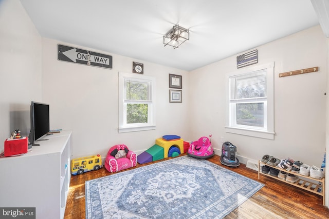 recreation room with wood finished floors