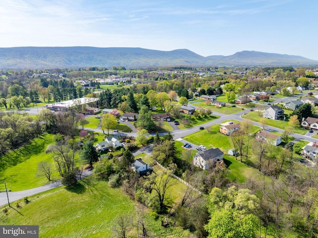 birds eye view of property with a residential view and a mountain view
