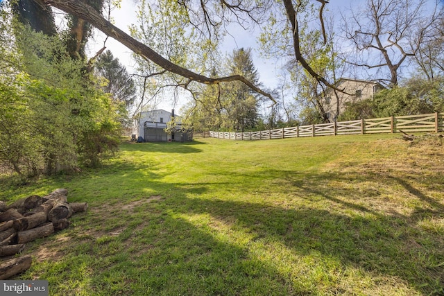 view of yard featuring fence