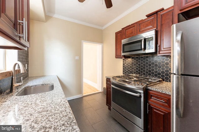 999 N Randolph St, Philadelphia, PA 19123 - kitchen with ceiling fan, tasteful backsplash, ornamental molding, a sink, and stainless steel appliances
