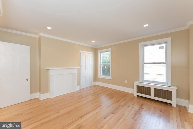 999 N Randolph St, Philadelphia, PA 19123 - unfurnished room with baseboards, recessed lighting, crown molding, light wood-style floors, and radiator
