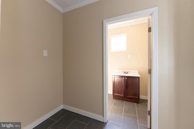 999 N Randolph St, Philadelphia, PA 19123 - hallway featuring crown molding, a sink, and baseboards