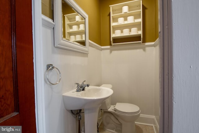 1323 W 41st St, Baltimore, MD 21211 - bathroom with toilet and wainscoting
