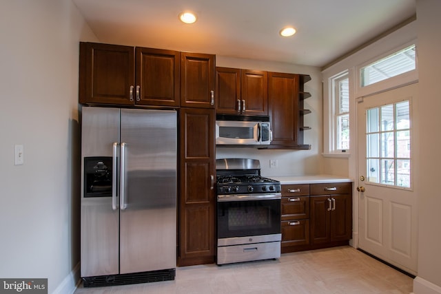 1323 W 41st St, Baltimore, MD 21211 - kitchen featuring appliances with stainless steel finishes, light countertops, open shelves, recessed lighting, and dark brown cabinets