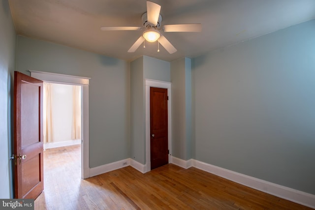 1323 W 41st St, Baltimore, MD 21211 - unfurnished room featuring wood finished floors, ceiling fan, and baseboards