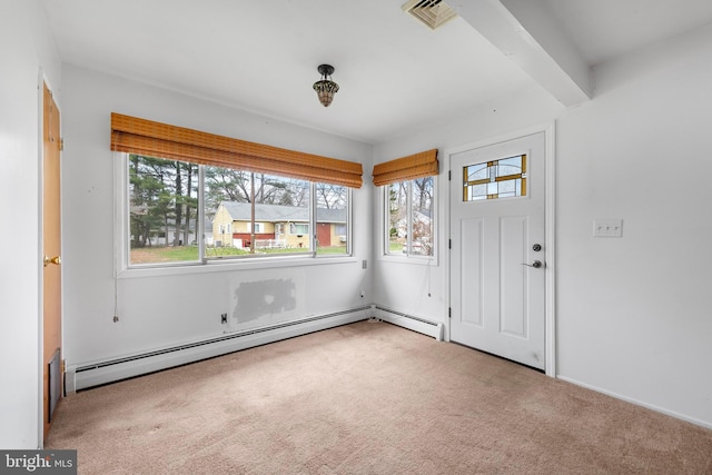 14B Heron St S, Manchester Township, NJ 08759 - carpeted entryway with visible vents, a healthy amount of sunlight, and baseboard heating