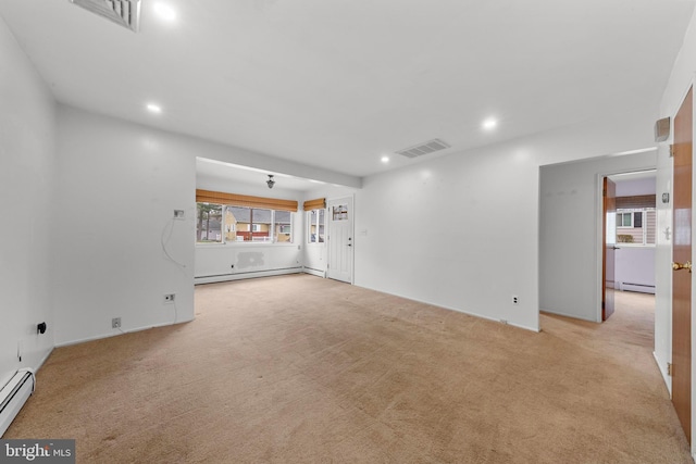 14B Heron St S, Manchester Township, NJ 08759 - unfurnished living room featuring a baseboard radiator, recessed lighting, and visible vents
