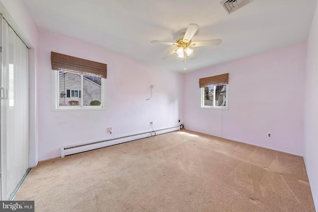 14B Heron St S, Manchester Township, NJ 08759 - carpeted empty room with baseboard heating, a ceiling fan, and visible vents