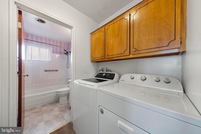 14B Heron St S, Manchester Township, NJ 08759 - washroom with cabinet space, light tile patterned floors, and washing machine and clothes dryer