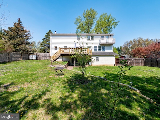 59 Hagan Dr, New Hope, PA 18938 - back of property featuring a deck, a yard, stairs, and a fenced backyard