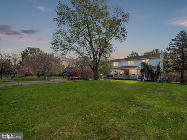 59 Hagan Dr, New Hope, PA 18938 - yard at dusk with fence and a porch