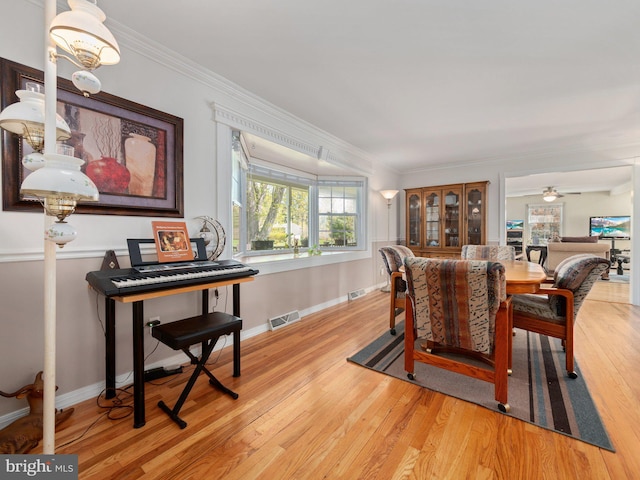 59 Hagan Dr, New Hope, PA 18938 - dining room with ornamental molding, visible vents, and light wood-type flooring