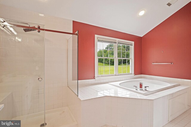8233 Gallery Ct, Gaithersburg, MD 20886 - full bathroom featuring a stall shower, vaulted ceiling, a garden tub, tile patterned floors, and recessed lighting