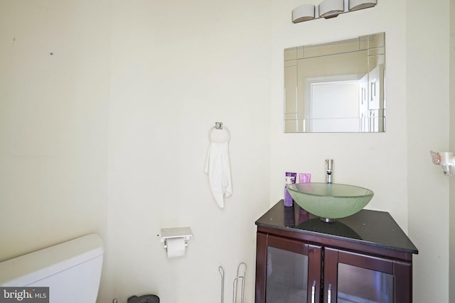 8233 Gallery Ct, Gaithersburg, MD 20886 - half bathroom featuring toilet and vanity