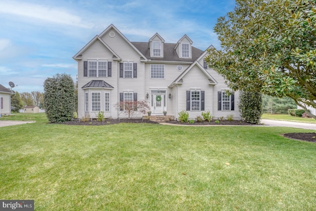 view of front of home featuring a front lawn