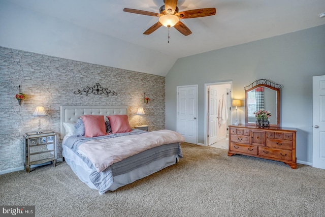 carpeted bedroom with baseboards, a ceiling fan, and vaulted ceiling