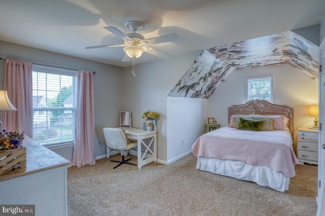 bedroom featuring carpet floors, a ceiling fan, vaulted ceiling, and baseboards