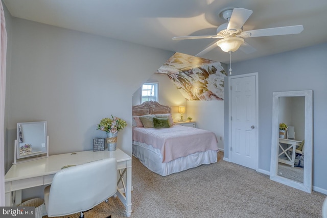 carpeted bedroom with baseboards and a ceiling fan