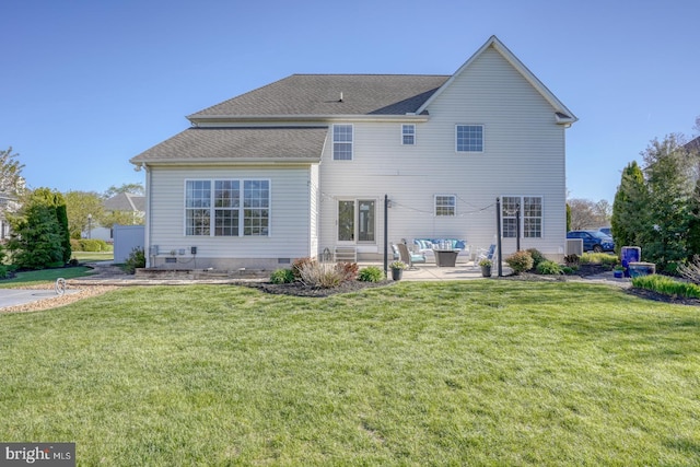 rear view of house featuring a lawn, crawl space, and an outdoor hangout area