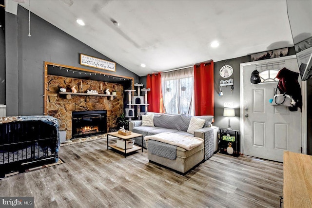 7443 Tamara Ln, Tobyhanna, PA 18466 - living room featuring wood finished floors, a fireplace, lofted ceiling, and recessed lighting