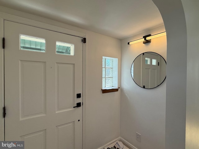 6134 Marglenn Ave, Baltimore, MD 21206 - foyer featuring baseboards and arched walkways
