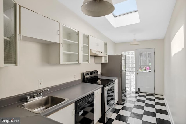 kitchen featuring black dishwasher, under cabinet range hood, stainless steel range with electric cooktop, a sink, and dark floors