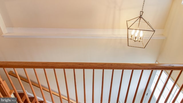 2080 Capstone Cir, Herndon, VA 20170 - stairs featuring a chandelier
