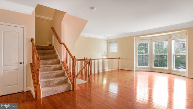 2080 Capstone Cir, Herndon, VA 20170 - staircase with hardwood / wood-style floors, baseboards, and ornamental molding